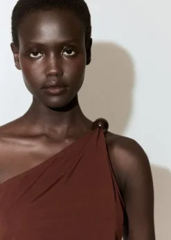 Asymmetric appliqué top