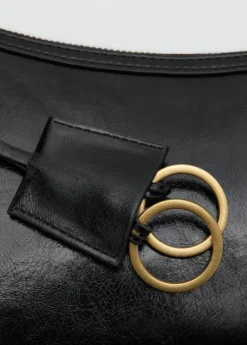 Crossbody bag with charms and rings