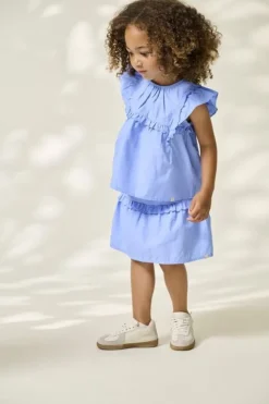 KMGCLARE RUFFLE SKORT WVN