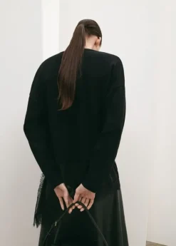 long lace-trimmed sweater