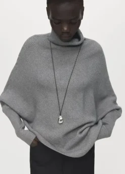 Sweater with asymmetrical roll neck