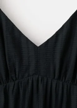 Textured dress with ruched detail